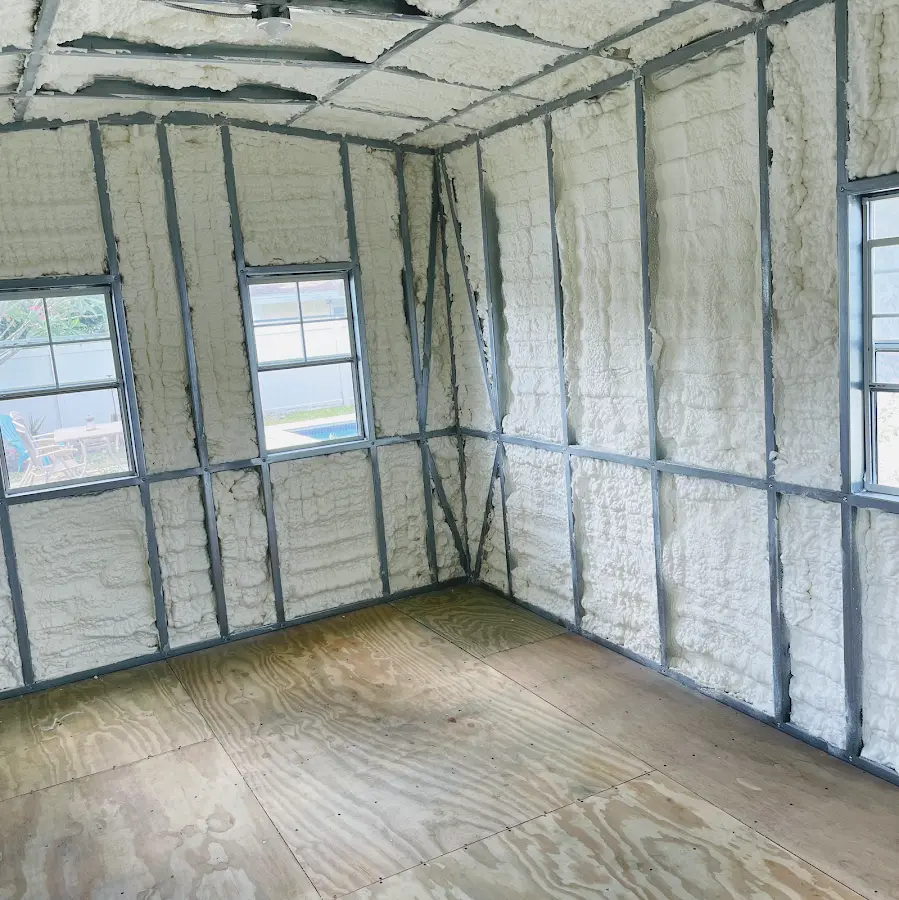 Closed-cell spray foam insulation applied to wall cavities in a residential project in Timberlane